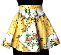 Pretty in a apron while cookin in the kitchen